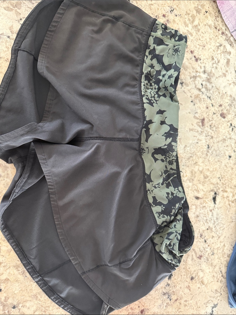 lululemon black shorts with green floral waistband